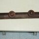 Wooden wall-mounted coat rack