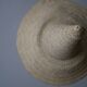 Chapeau paille osier tressé main objet décoration campagne bohème ethnique fabrication artisanale