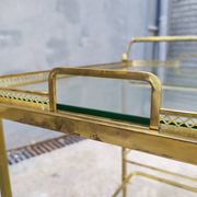 Golden brass cart