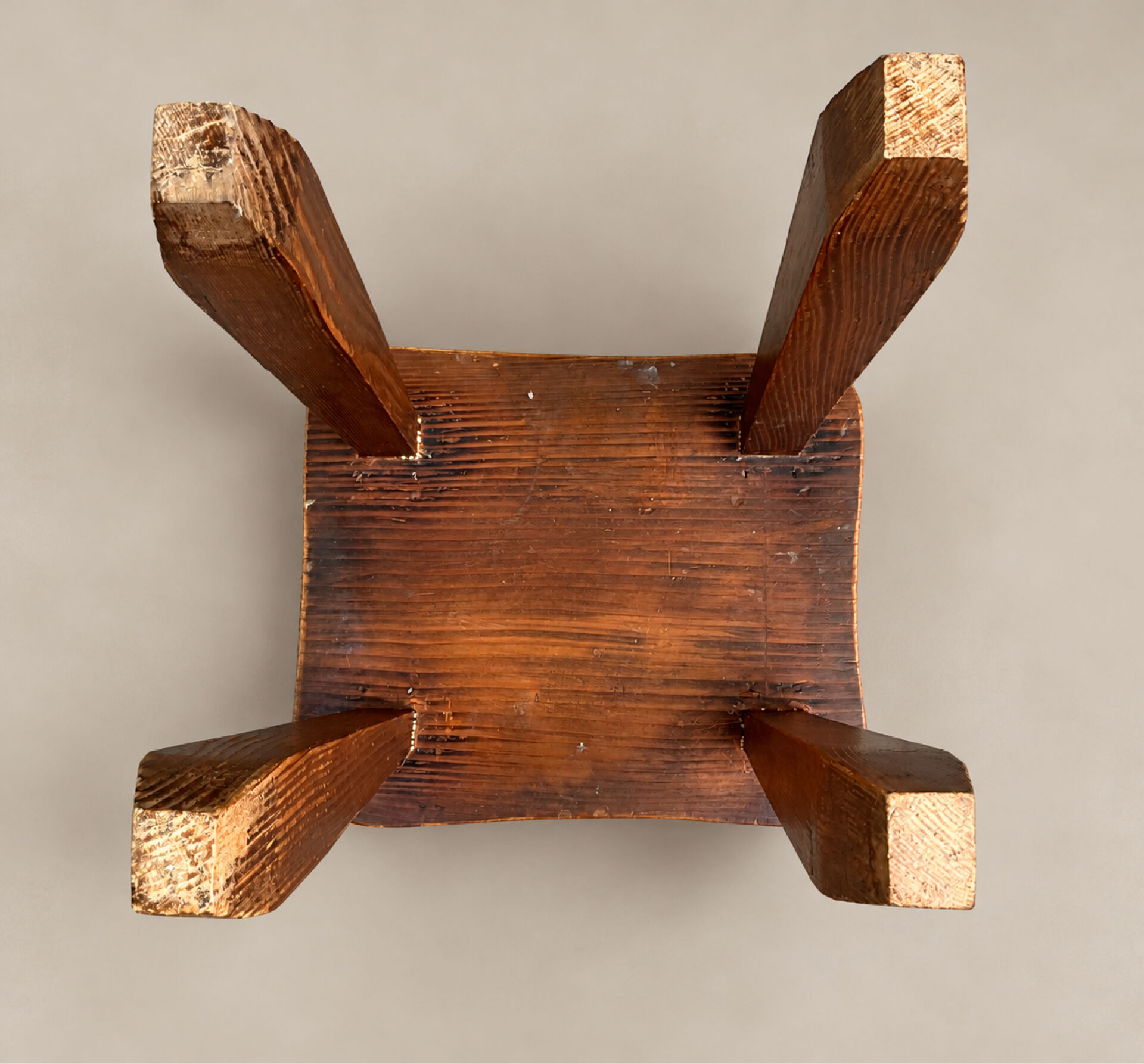Vintage sculptural solid wood stool, brutalist style.
