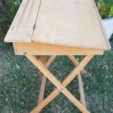 Children's desk with crossed legs