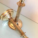 Pair of empire style brass candlesticks