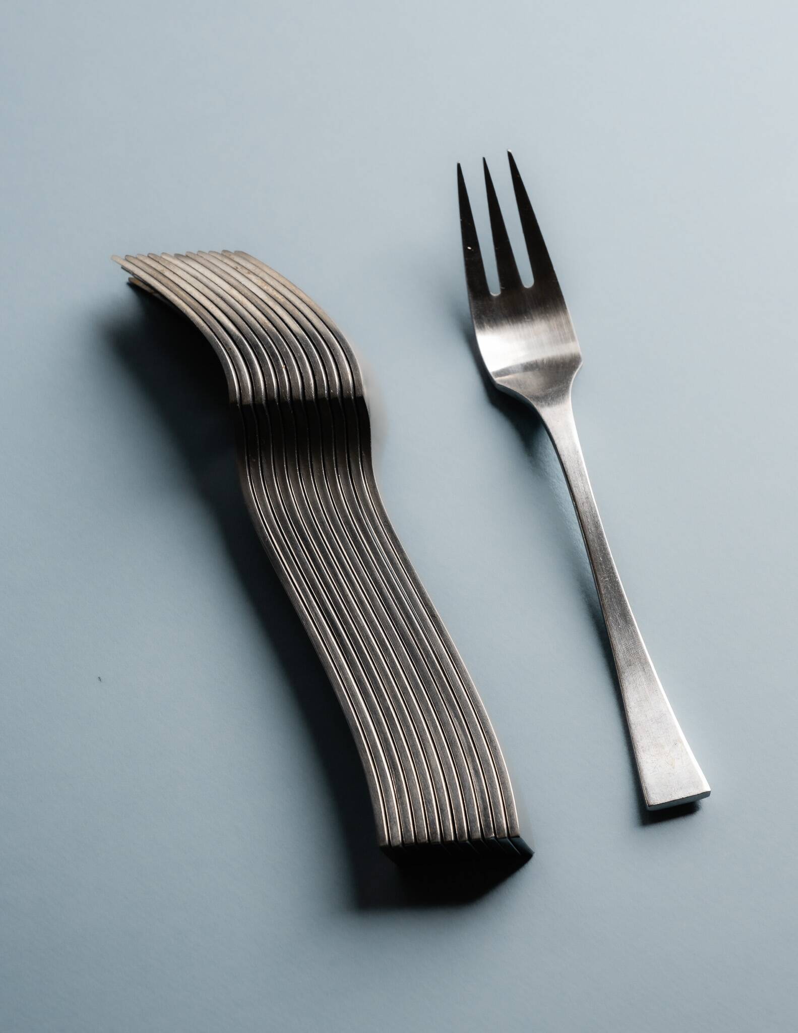 GUY DEGRENNE STAINLESS STEEL CUTLERY SET, 1970s