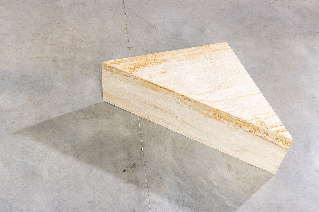 Triangular travertine lounge table around 1970 on the modernism