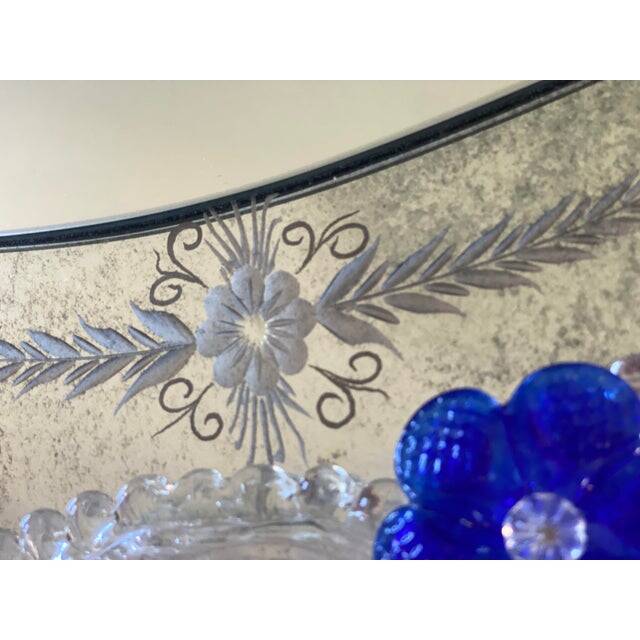 Early 21st century venetian oval floreal hand-carving mirror in murano glass