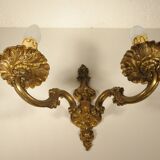 Pair of two-light wall lights in gilded bronze