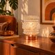 Punkette — Vintage table lamp in transparent glass with rose gold reliefs.