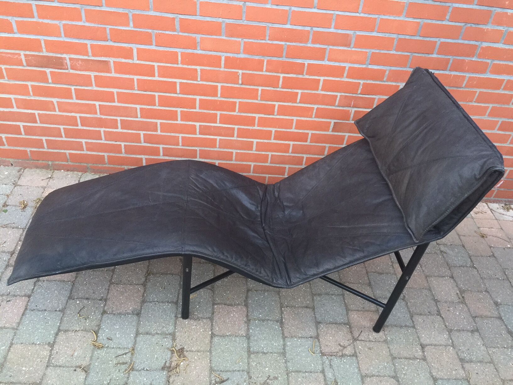 Leather lounge chair  by wrong Björklund  1980 s