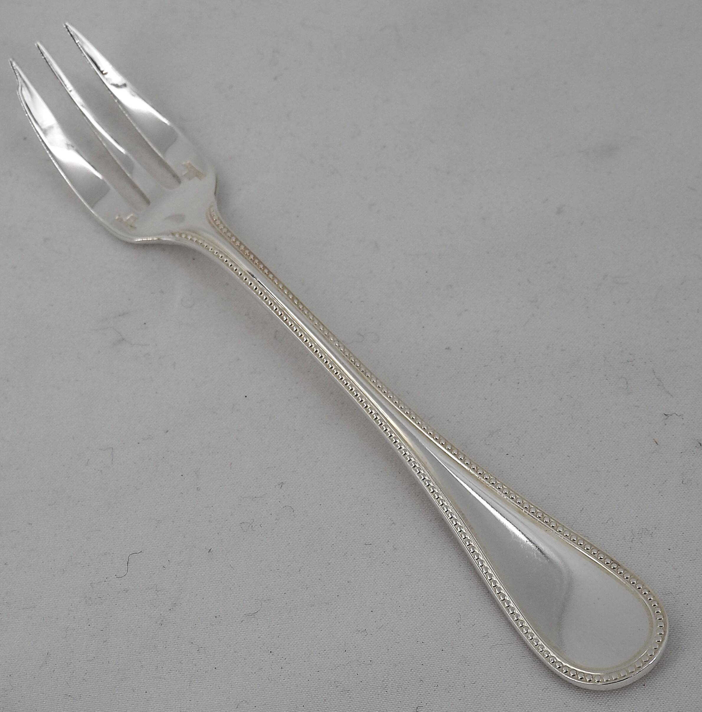 Christofle Perles 12 silver-plated cake forks, excellent condition.