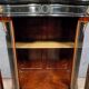 Curved "Boulle" display case from the Napoleon III period in blackened and gilded wood