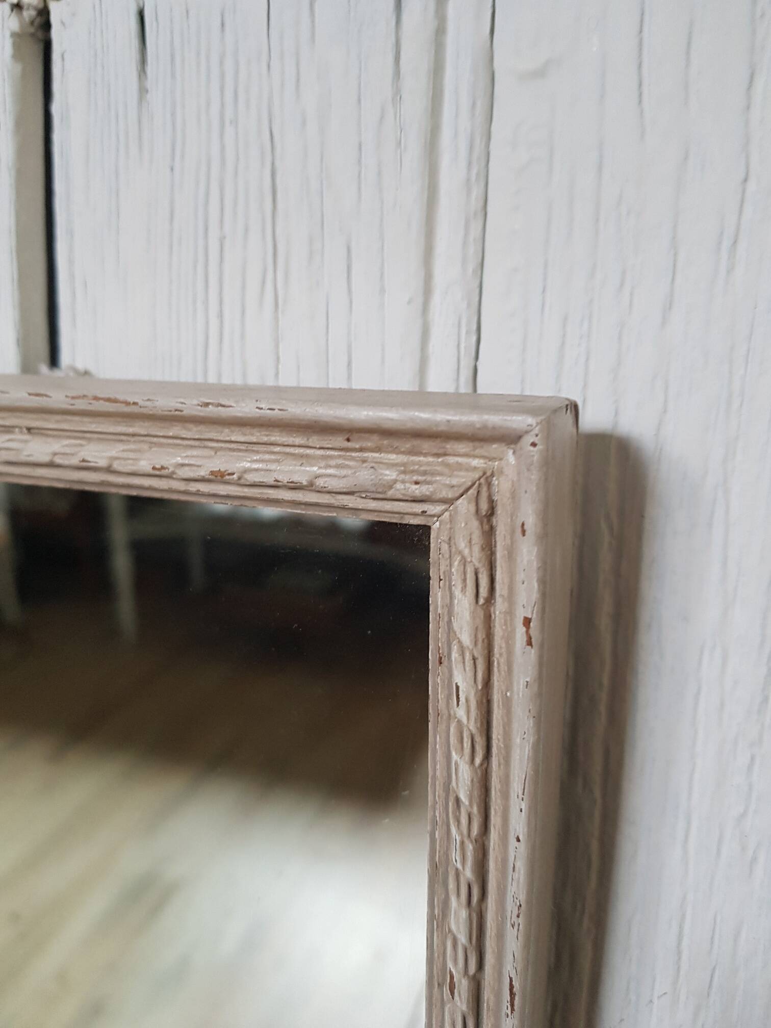 Small patinated wooden linen mirror