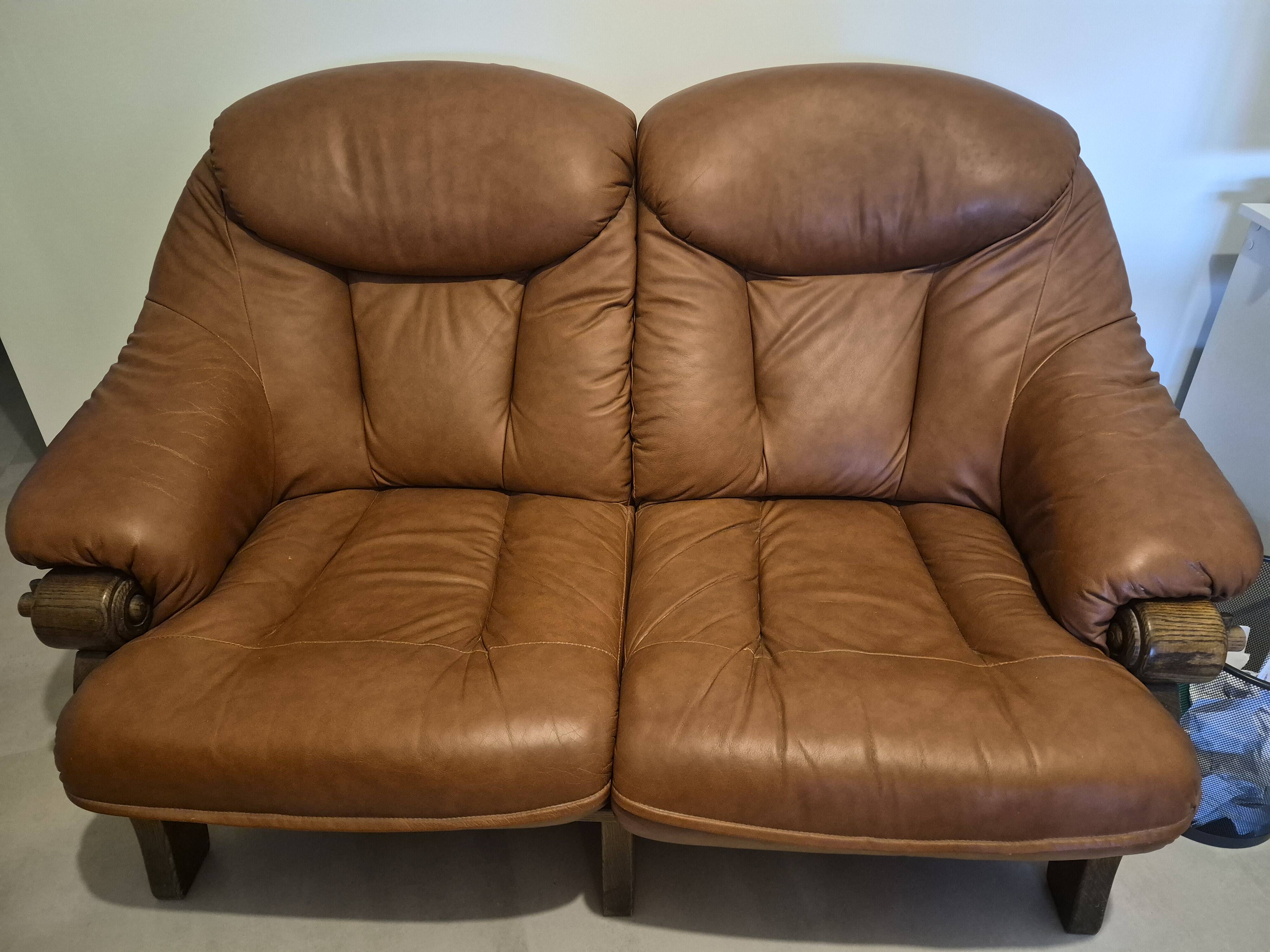Vintage Scandinavian two-seater sofa in cognac leather and solid oak.