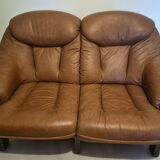 Vintage Scandinavian two-seater sofa in cognac leather and solid oak.