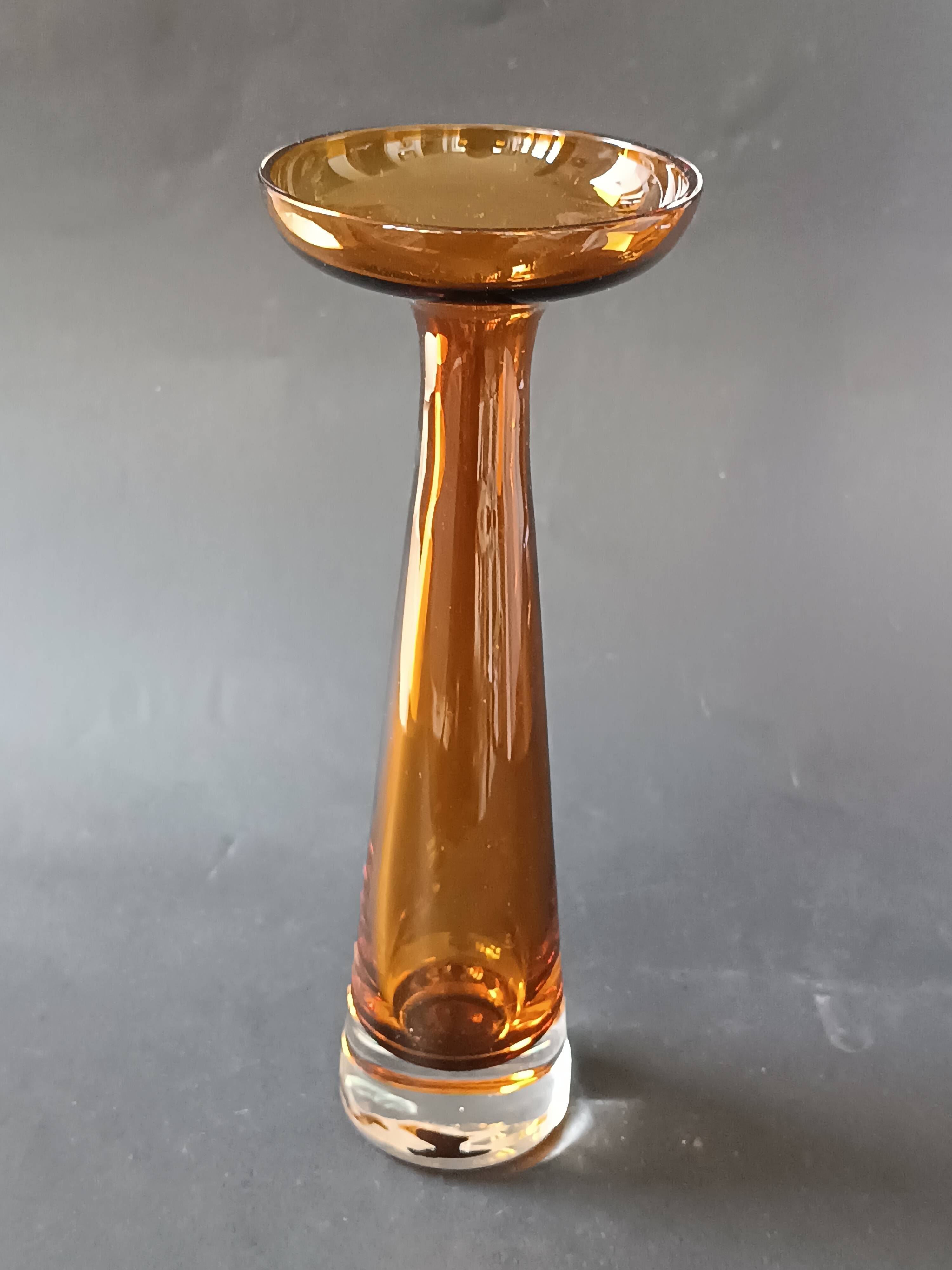 Two vintage Scandinavian double-layered amber blown glass candlesticks