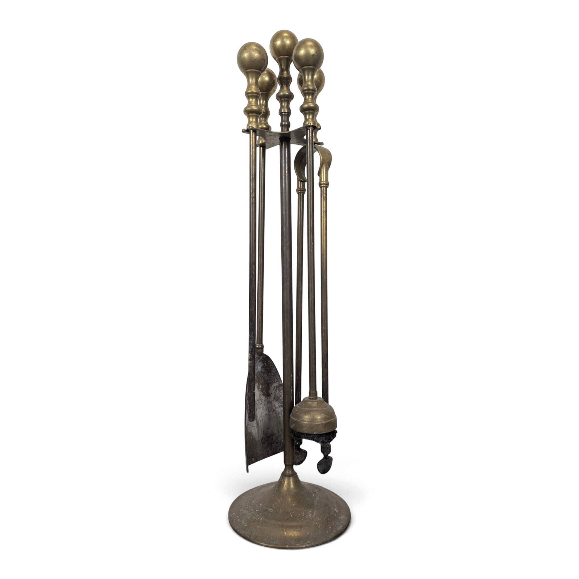 Brass fireplace tool set with four accessories