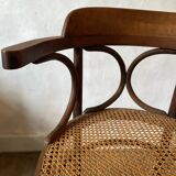 Cane and curved wood armchair