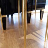 Pair of nightstands in anthracite colored glass and brass