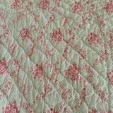 Quilted floral bedspread