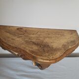 Wall shelf in gilded wood