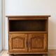 Traditional antique TV cabinet made of solid wood.