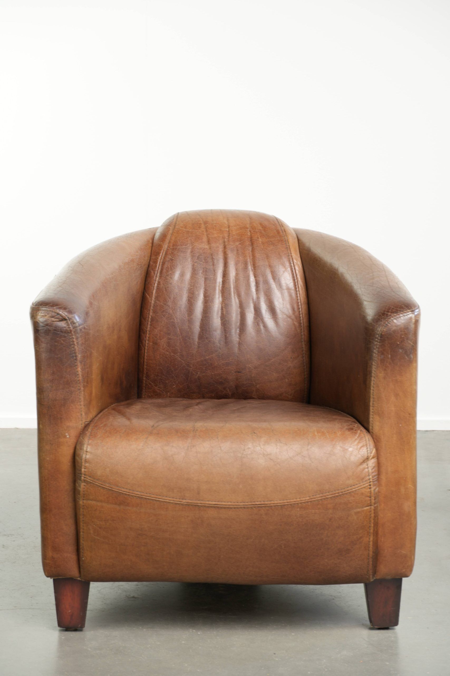 Fauteuil design aviateur en cuir de vache couleur cognac intemporelle