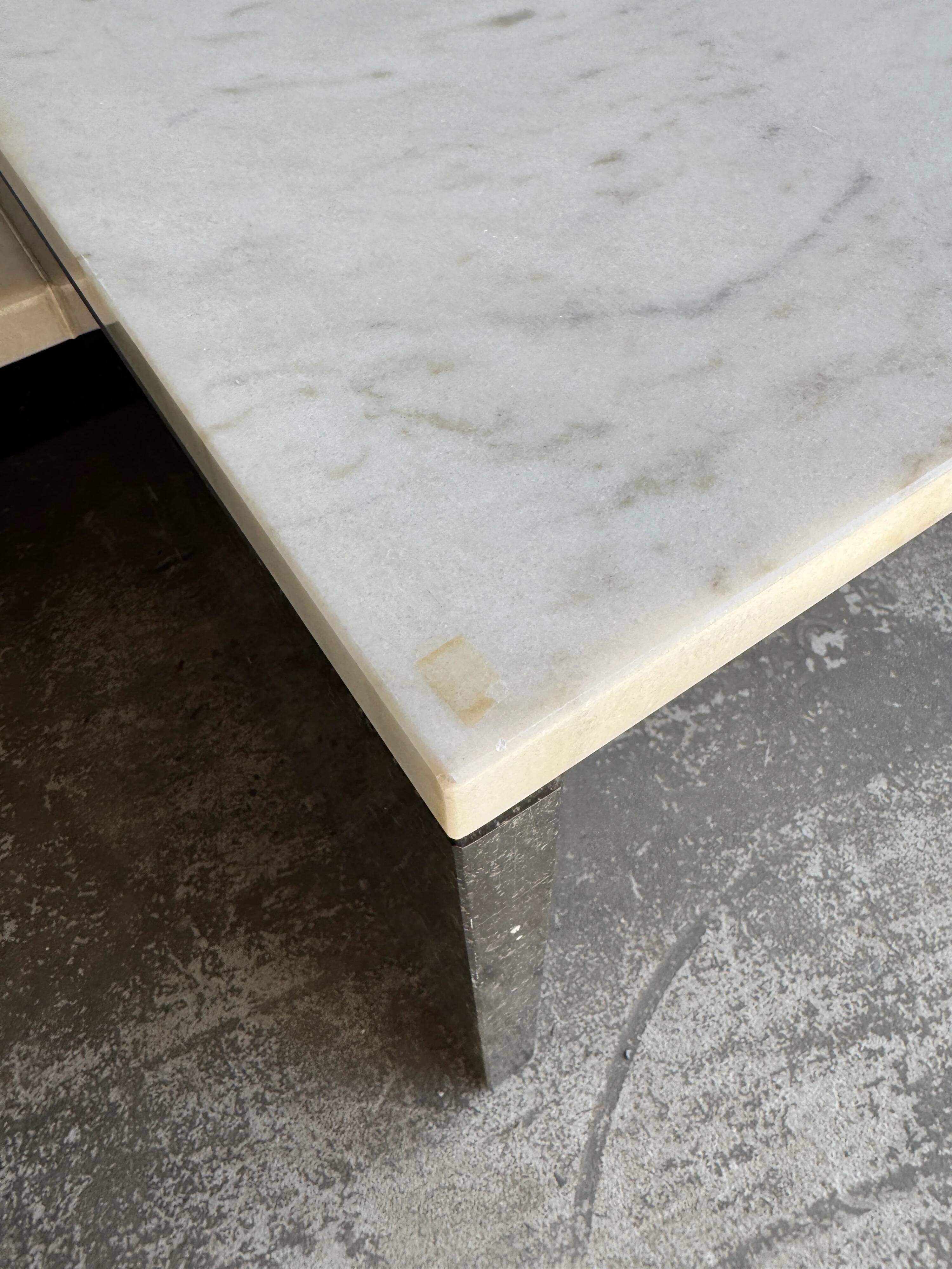 Unique postmodern coffee table in marble and granite.