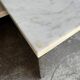 Unique postmodern coffee table in marble and granite.
