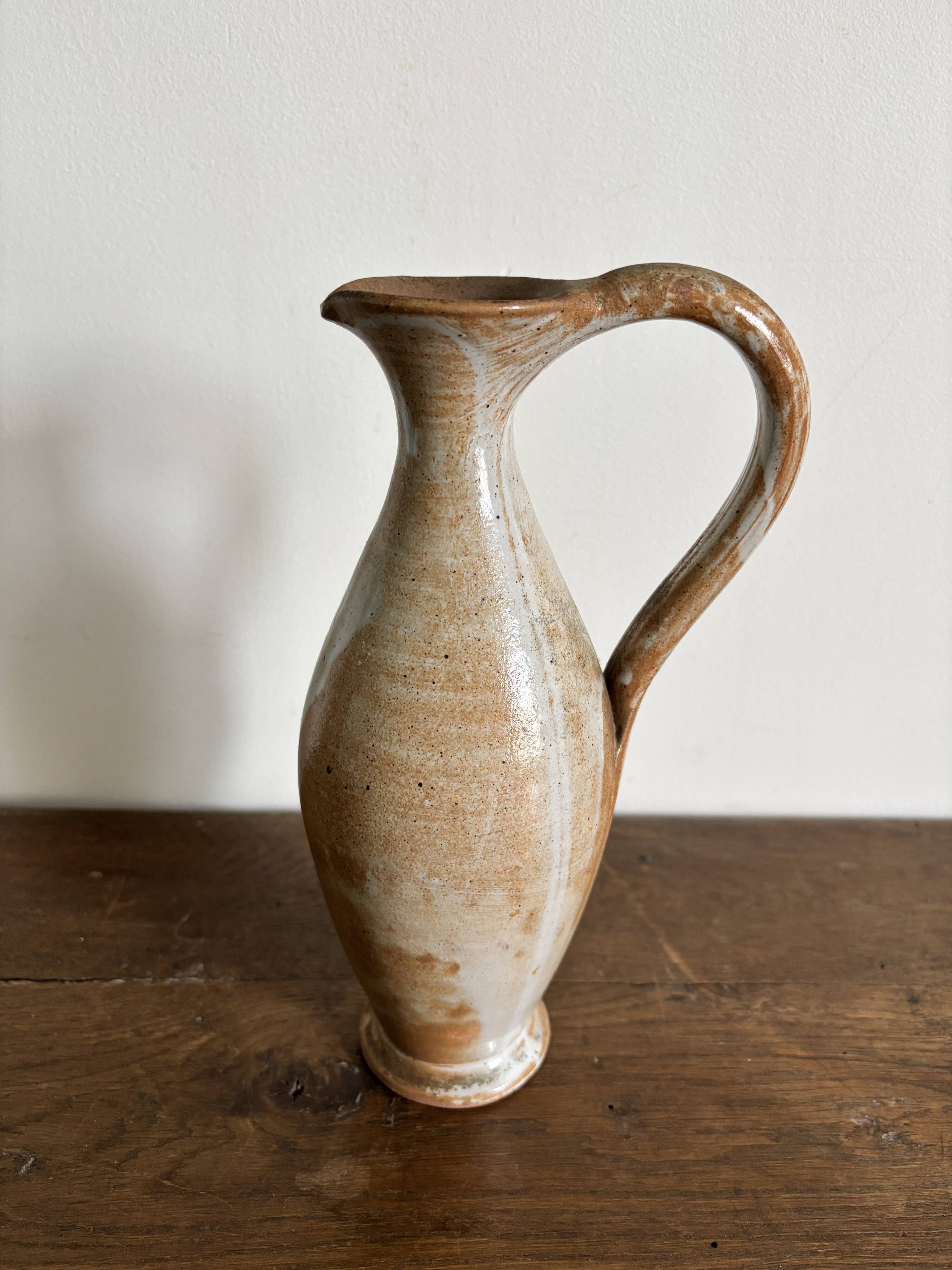 Handcrafted stoneware vase, a vintage piece from the 1960s.