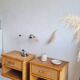Pair of vintage rattan bedside tables from the 1970s.