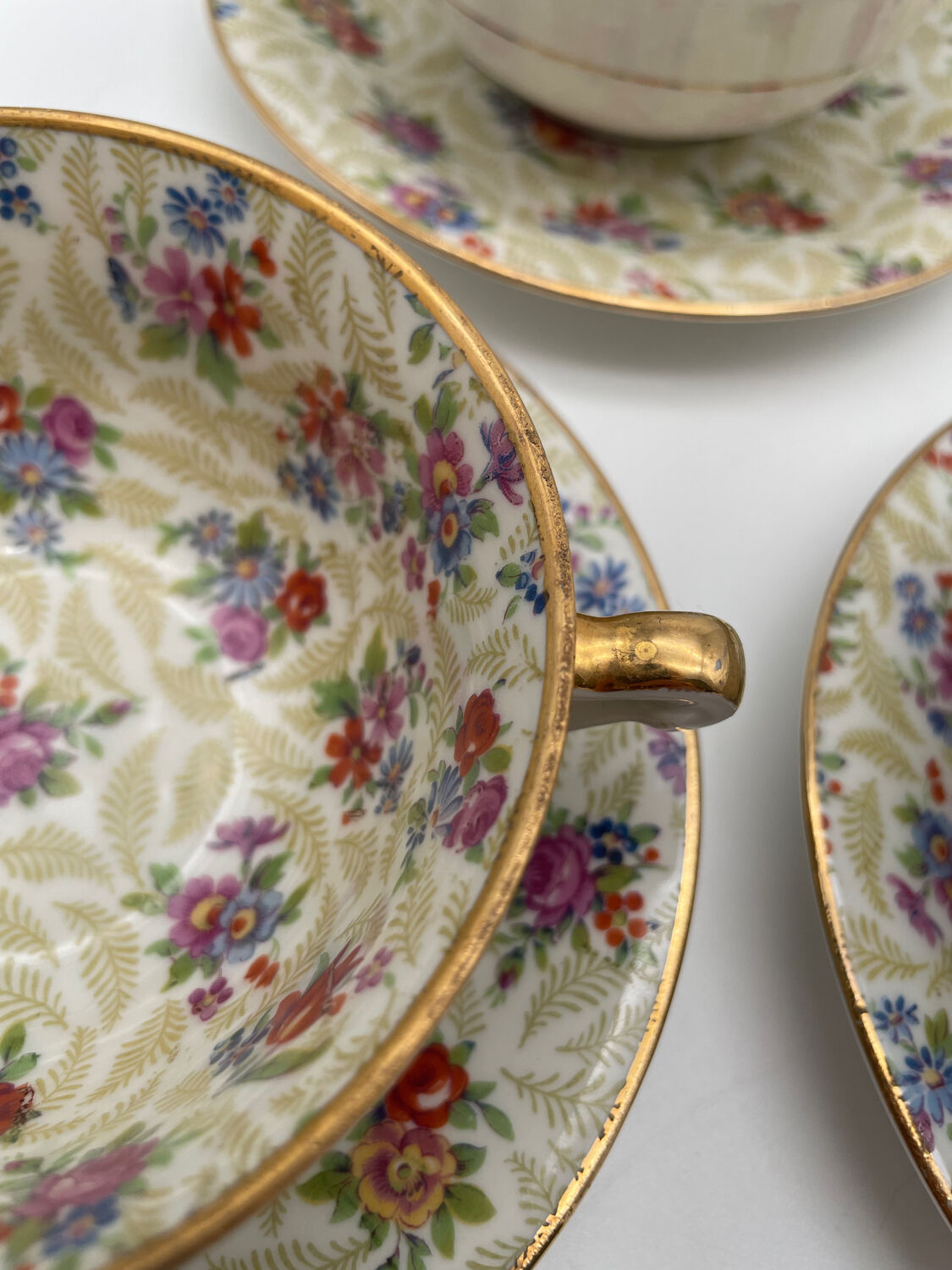 Set of 8 Limoges porcelain coffee cups from France with floral and gold pattern