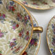 Service 8 tasses à café en porcelaine de Limoges France motif floral et doré