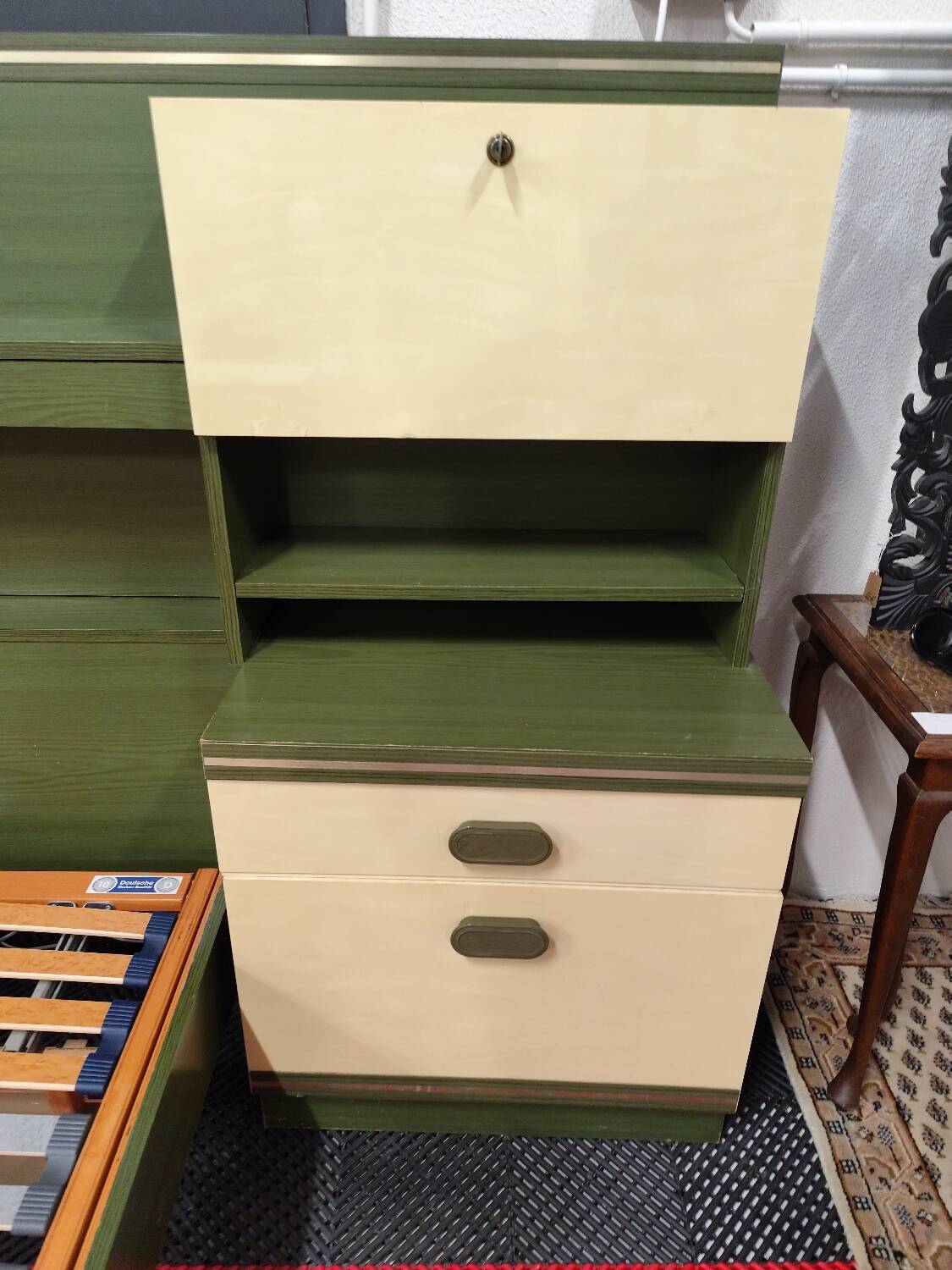Vintage king-size bed with headboard furniture and built-in radio.