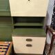 Vintage king-size bed with headboard furniture and built-in radio.