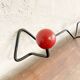 Seventies coat rack/coat hook, green-yellow-red metal and wood