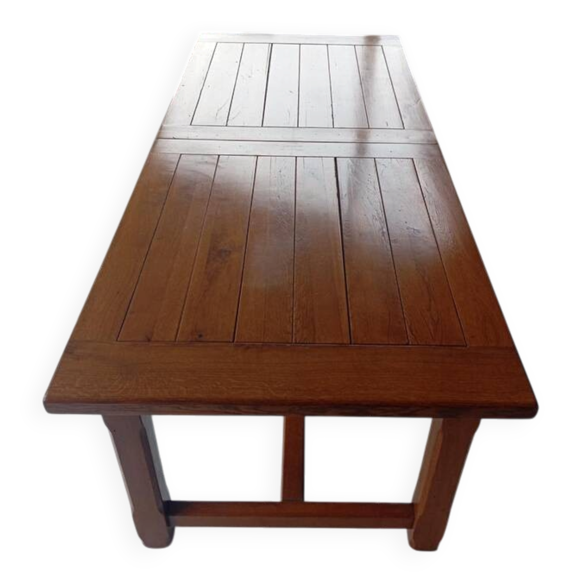 Large rectangular dining table in solid oak in a neo-rustic style.