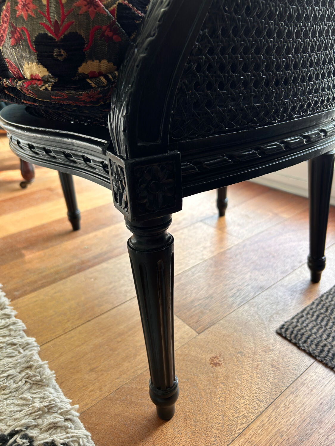 Louis XVI armchair with caning and dark green velvet