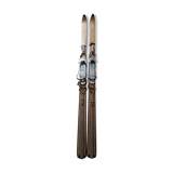 Nordic skiing in wood and skin former