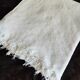 White woven cotton bedspread with fringes