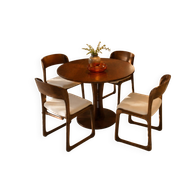 Four vintage Baumann sled chairs from the 1960s 1970s.