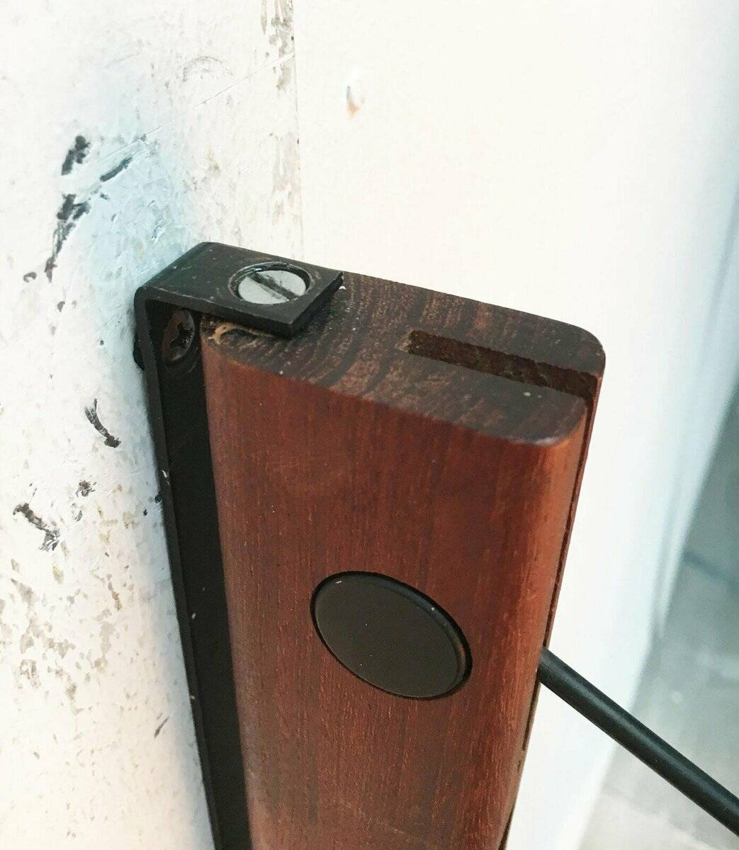 Mid-century pivoting wall lamp with a swing arm, Cocoon, made of teak wood, 1960s.