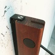 Mid-century pivoting wall lamp with a swing arm, Cocoon, made of teak wood, 1960s.