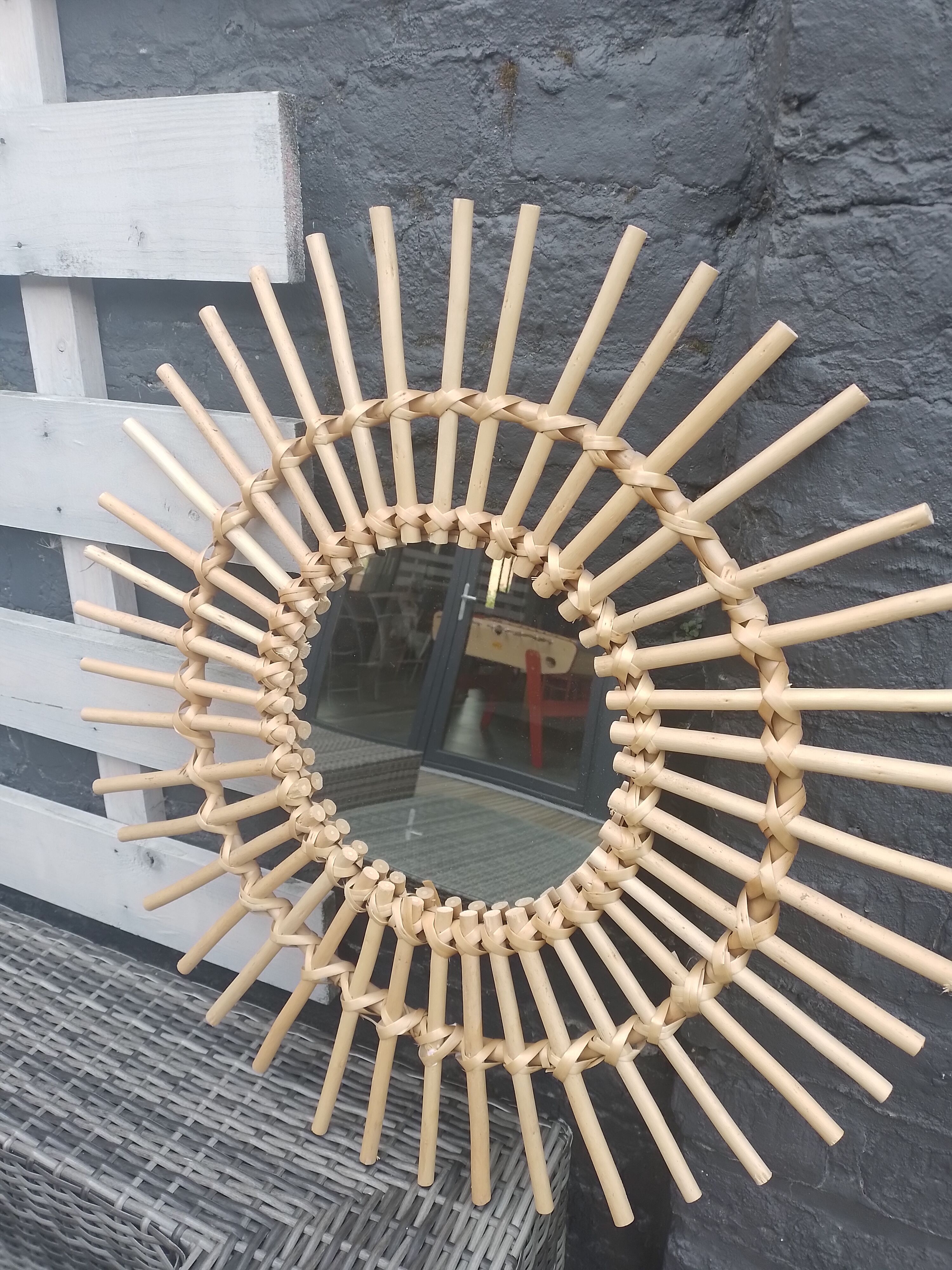 Vintage circular rattan mirror