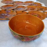 12 dessert plates and deep dishes from Salins-les-Bains, France.