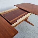 Extendable teak dining table from Dyrlund, Denmark 60s