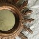 Miroir soleil en bois doré, 60