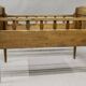 Antique children's bed from the 19th century.