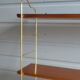 Wall shelves in brass and teak of the 1960s