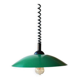 Green metal suspension rises and falls.