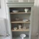 Louis Philippe style bookcase reenchanted in verdigris, 3 light oak waxed shelves.