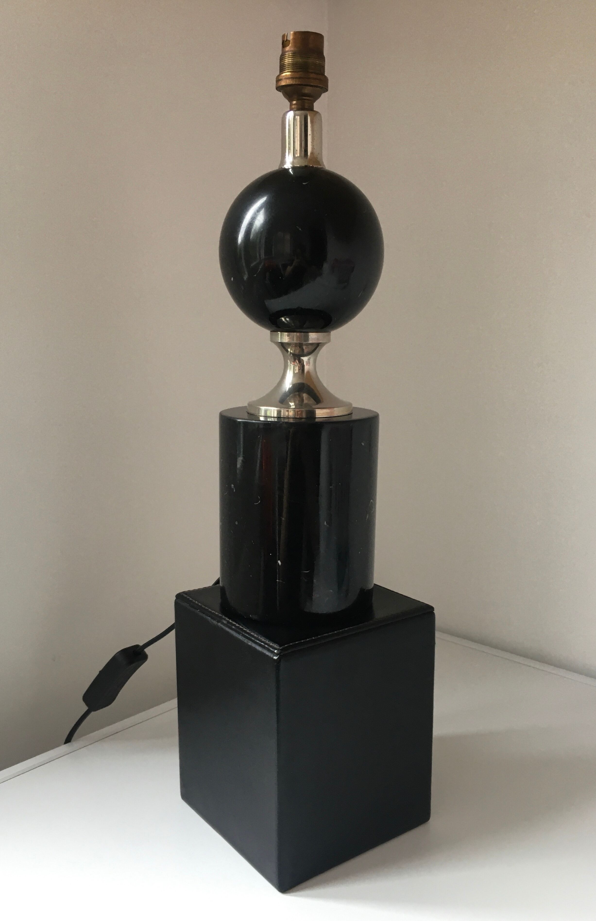 Philippe Barbier, Beautiful lamp to lay in black marble and chrome metal
